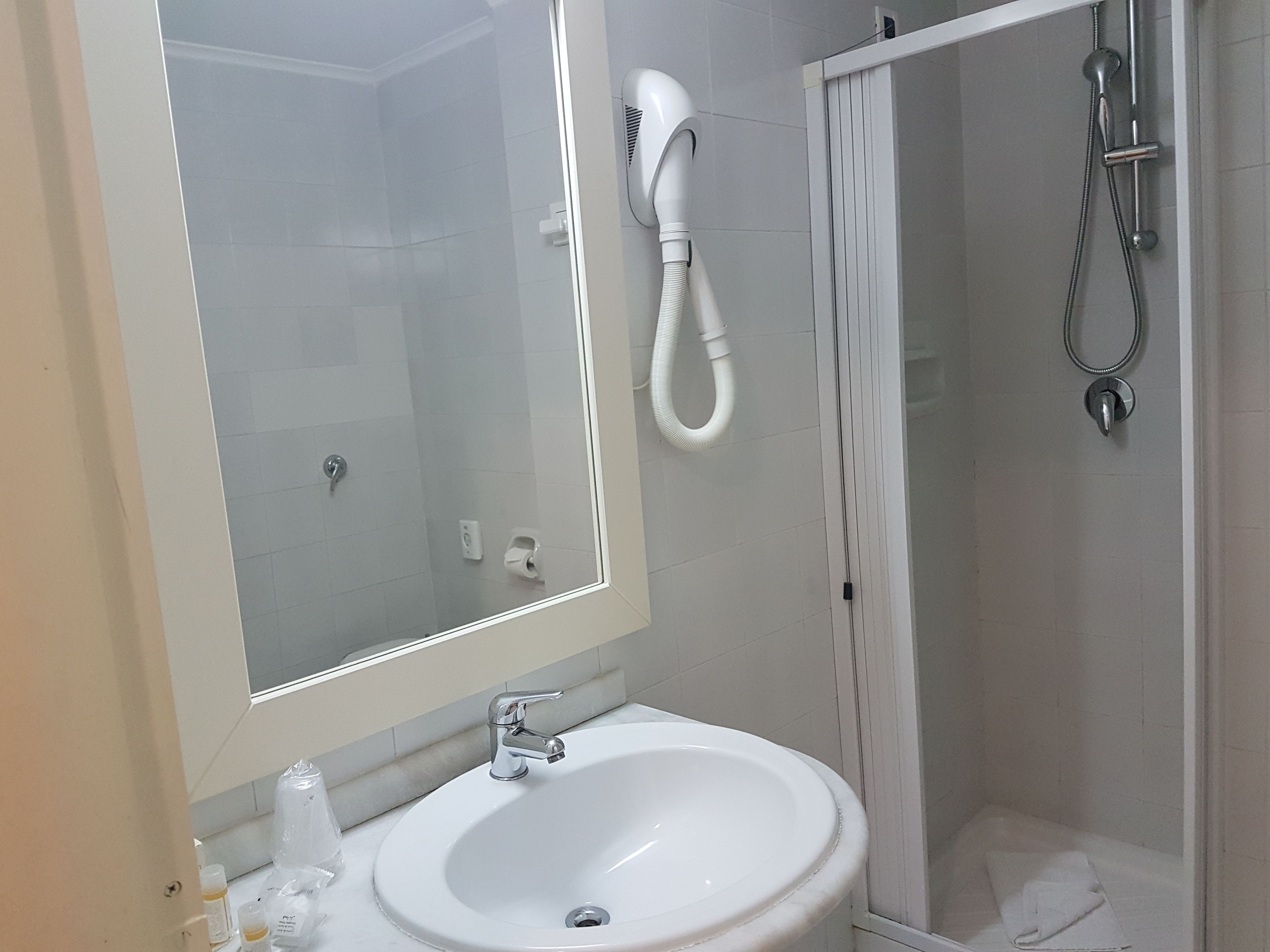 free toiletries, hair dryer, slippers, bidet