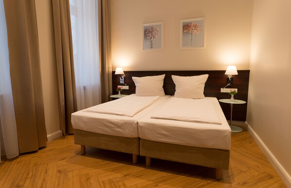 Hypo-allergenic bedding, in-room safe, desk, laptop workspace
