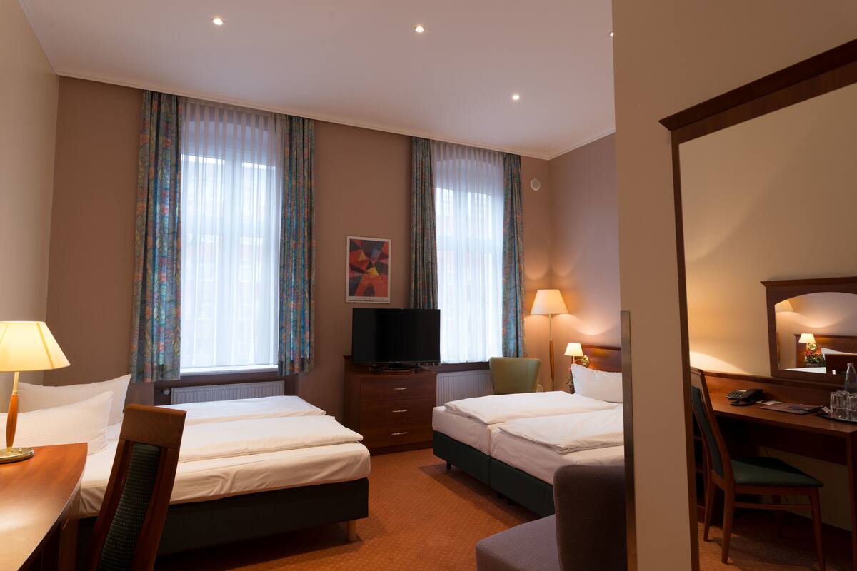Quadruple Room | Hypo-allergenic bedding, in-room safe, desk, laptop workspace
