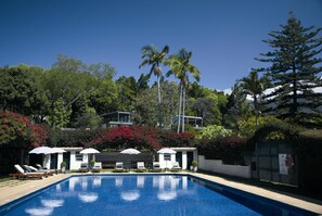2 outdoor pools, pool umbrellas, pool loungers