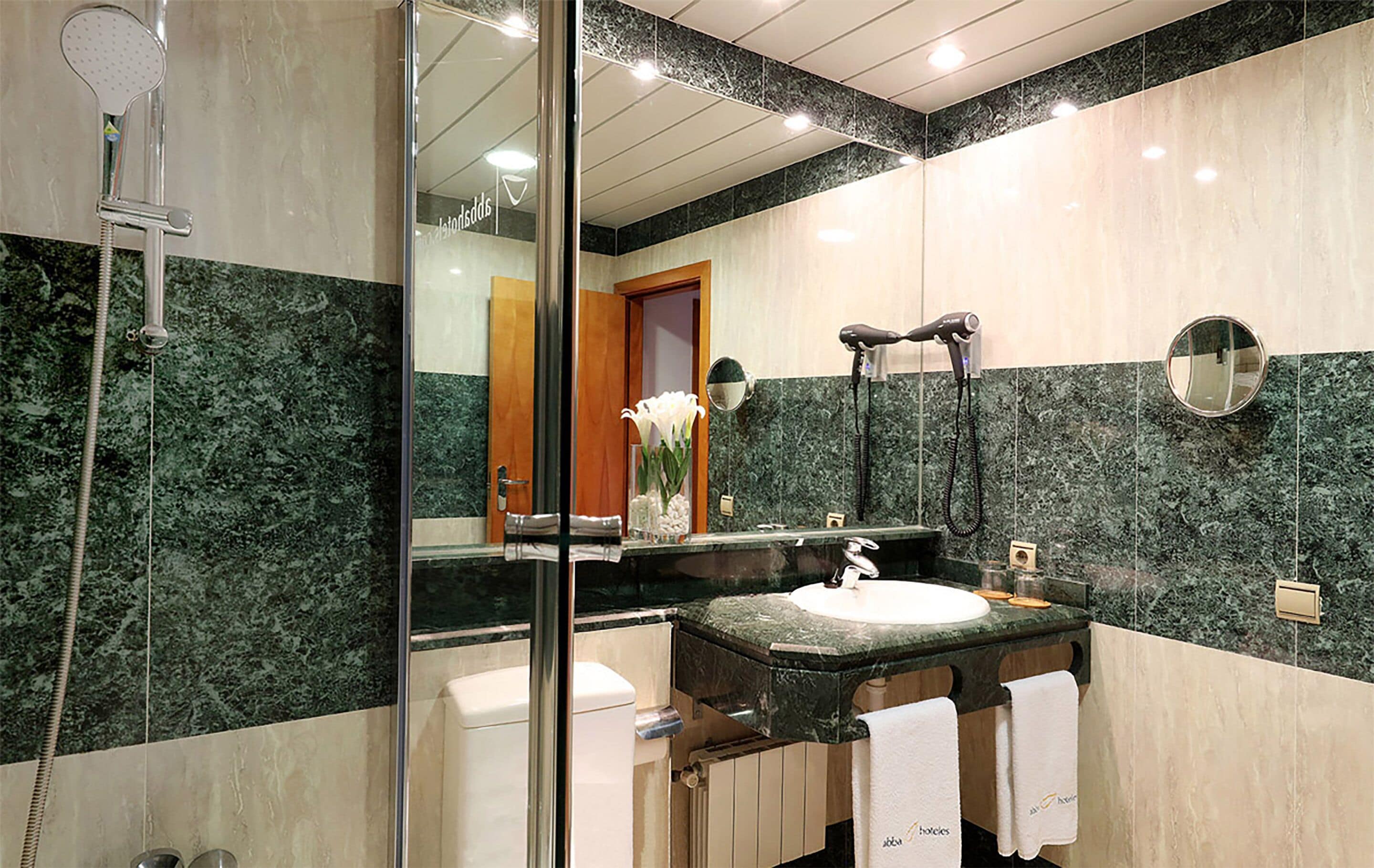 comfort room | bathroom | bathtub, designer toiletries, hair dryer, bidet