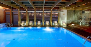 Indoor pool, open 7:00 AM to 11:00 PM, pool loungers