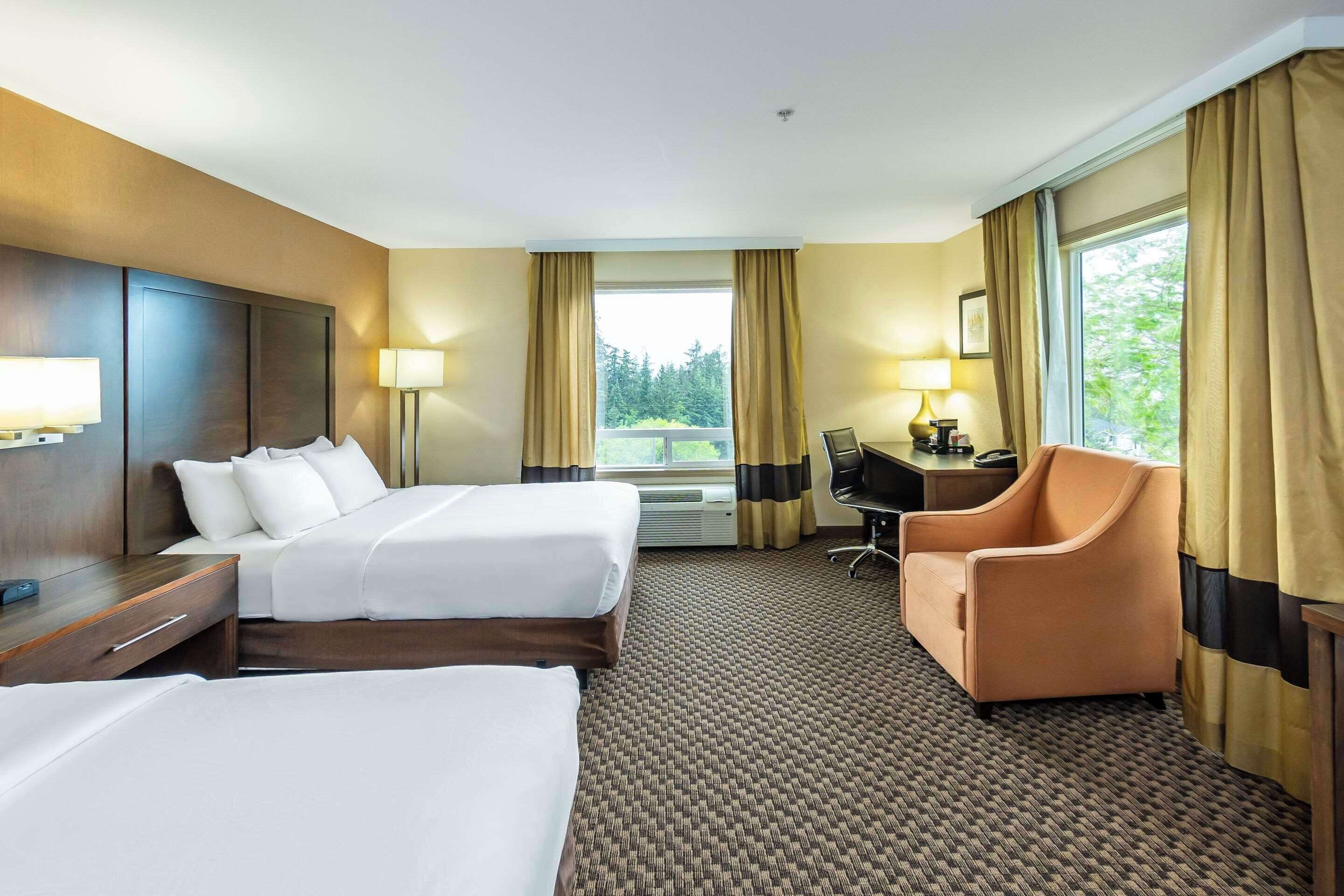 standard room, 2 queen beds, non smoking | desk, blackout curtains, iron/ironing board, free cots/infant beds