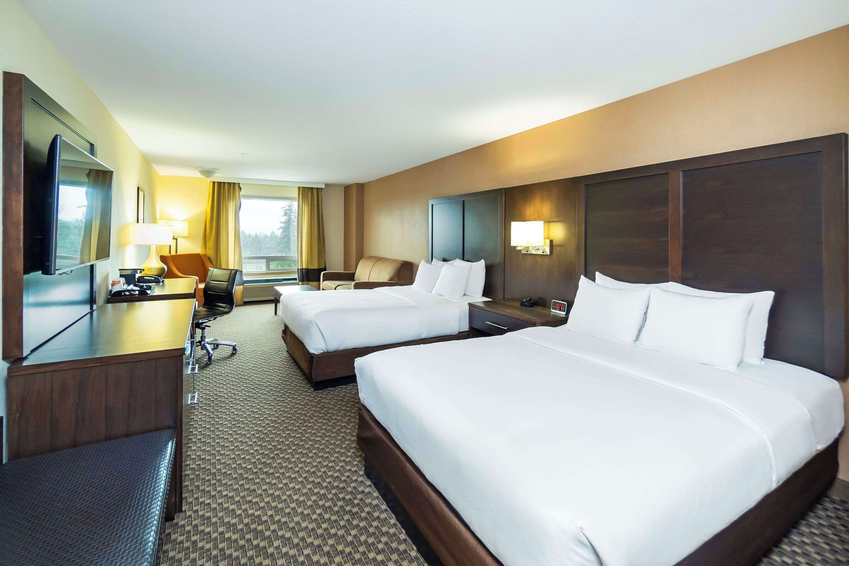 standard room, 2 queen beds with sofa bed, non smoking | desk, blackout curtains, iron/ironing board, free cots/infant beds