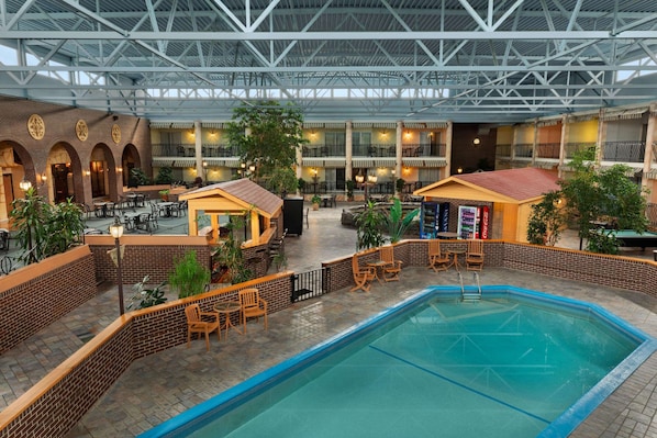 Indoor pool, open 9 AM to 10:00 PM, pool loungers