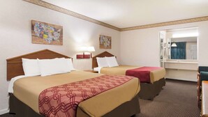 A hotel room with two beds, a nightstand with a lamp, a mirror, and two wall maps. - Econo Lodge Calhoun North Damascus (Calhoun)