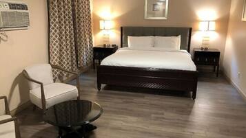 Pillowtop beds, desk, blackout drapes, iron/ironing board