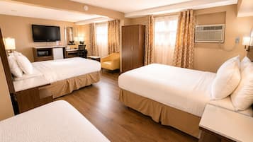 Pillowtop beds, desk, blackout drapes, iron/ironing board