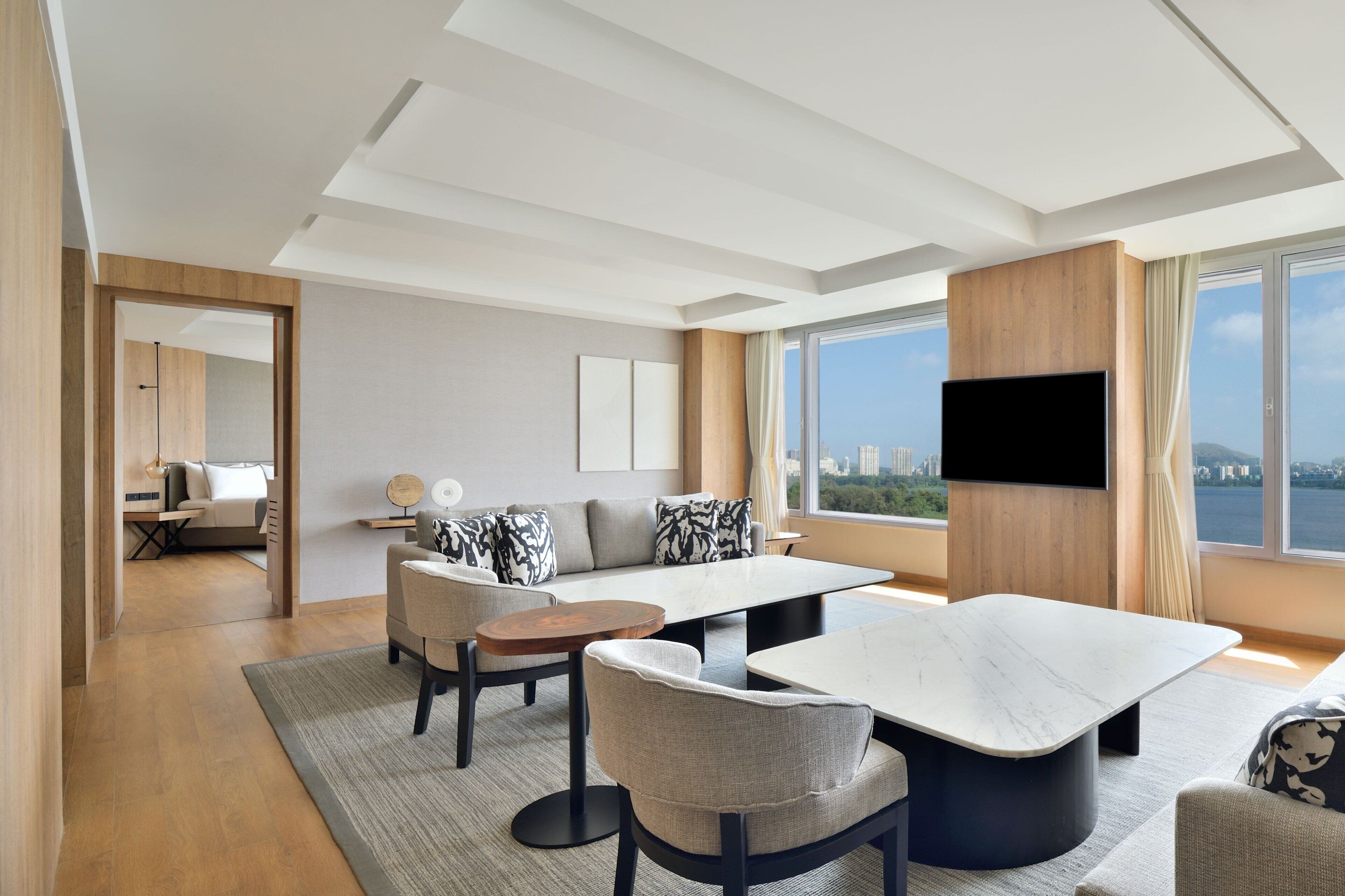 presidential suite, 1 king bed, non smoking, lake view | living room | 42-inch lcd tv with satellite channels, tv