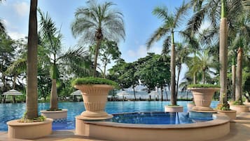 Outdoor pool, open 6:00 AM to 11:00 PM, pool umbrellas, sun loungers