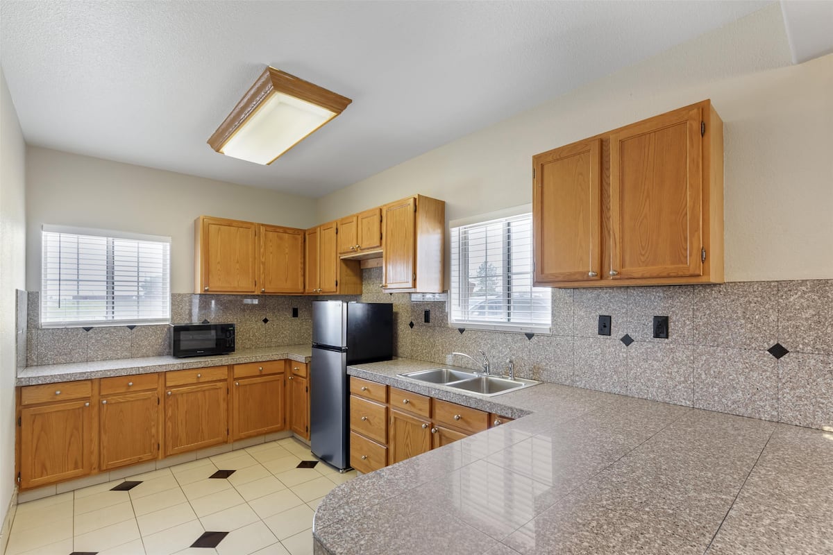 standard room, 2 queen beds, non smoking, refrigerator & microwave | 1 bedroom, desk, laptop workspace, iron/ironing board