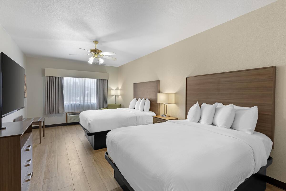Standard Room, 2 Queen Beds, Non Smoking, Refrigerator & Microwave | 1 bedroom, desk, laptop workspace, iron/ironing board