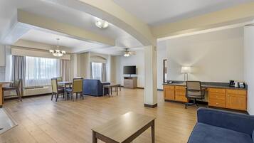 Premium bedding, desk, laptop workspace, iron/ironing board