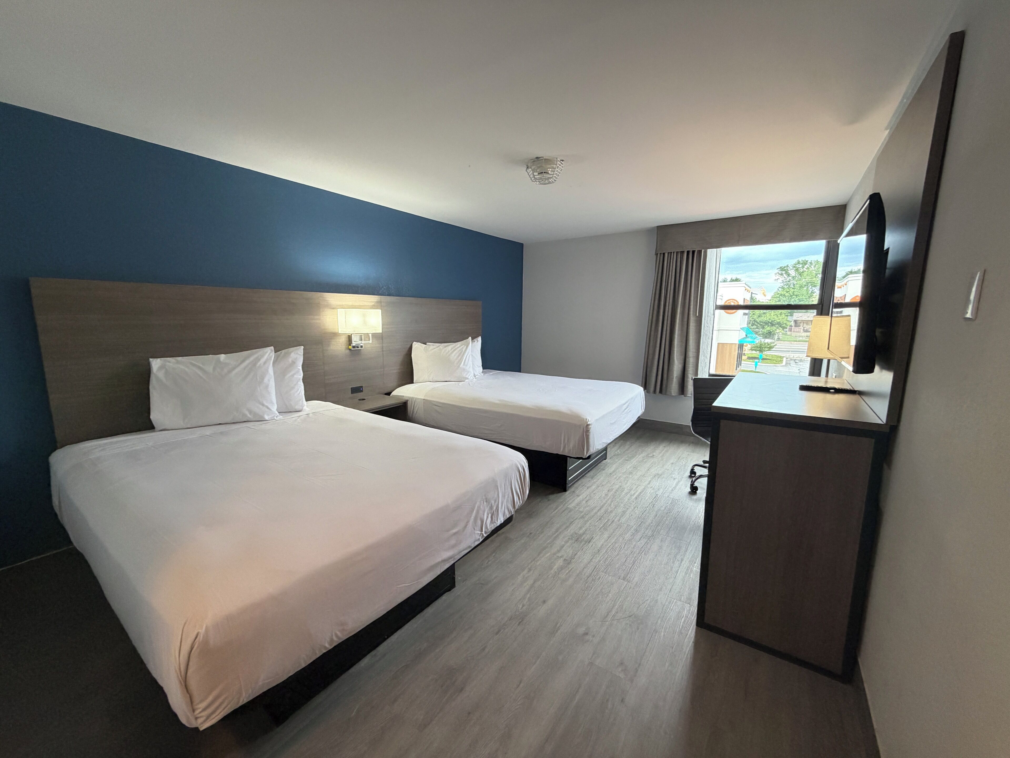 Cortinas blackout, Wi-Fi de cortesia, roupa de cama