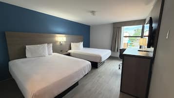 Cortinas blackout, Wi-Fi de cortesia, roupa de cama
