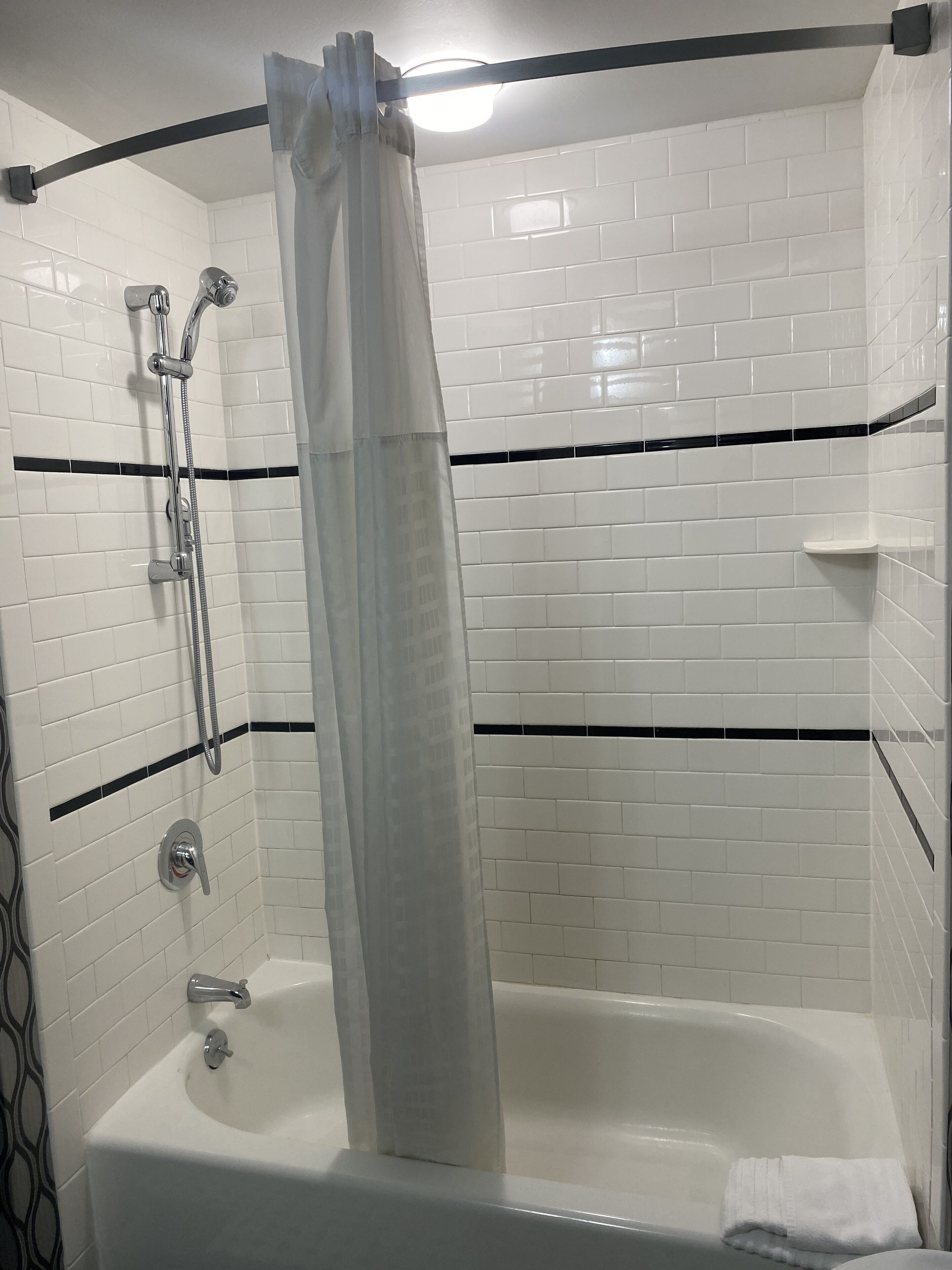 deluxe room, 2 queen beds, non smoking | bathroom | combined shower/bathtub, designer toiletries, hair dryer, towels