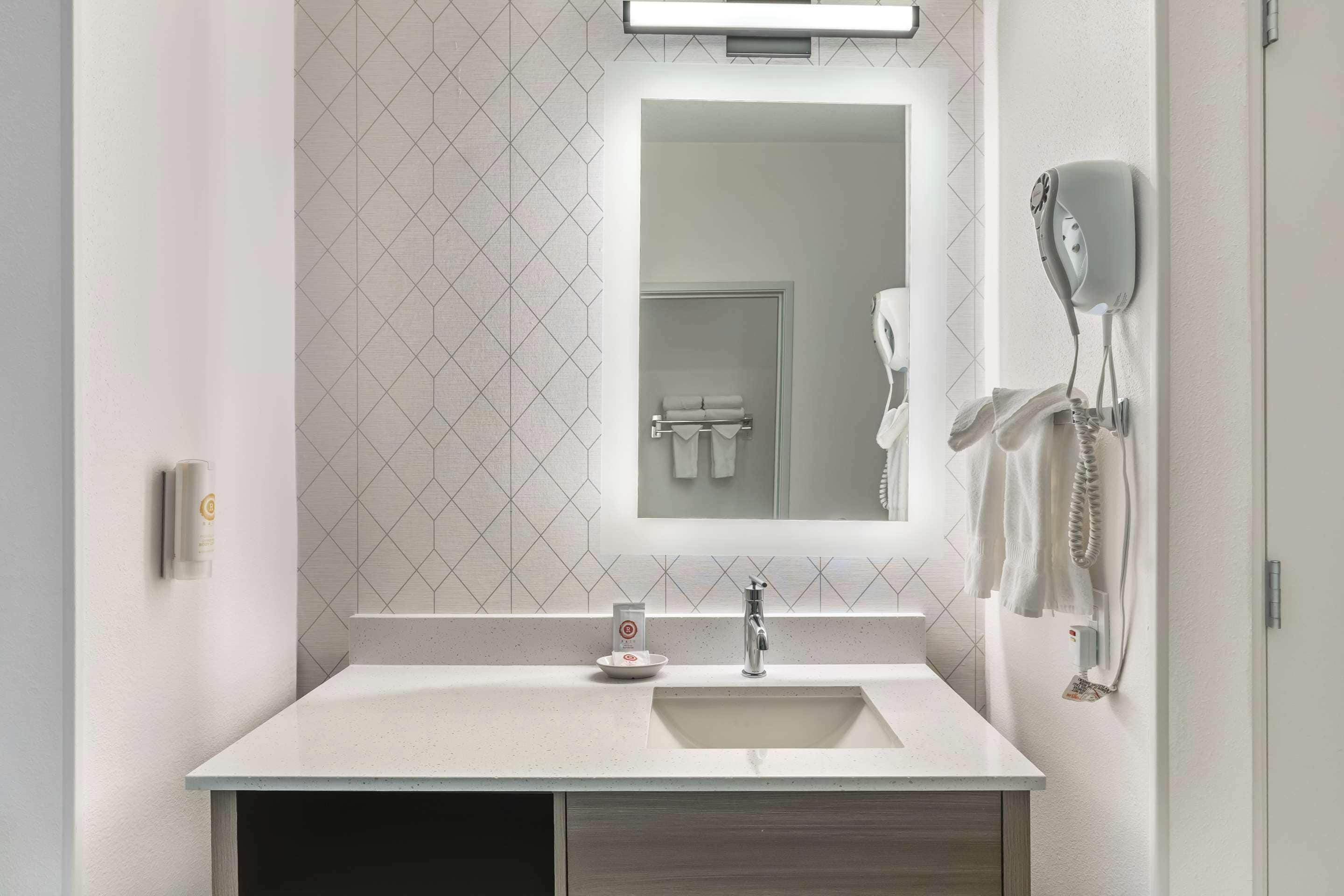 suite, 1 queen bed, accessible, non smoking (roll in shower) | bathroom | combined shower/bathtub, hydromassage showerhead, free toiletries