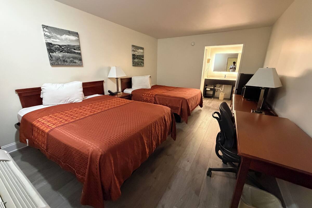 Desk, laptop workspace, blackout curtains, free WiFi
