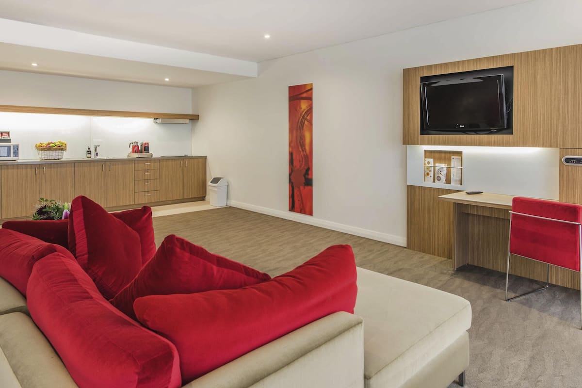 apartment, 1 bedroom | in-room safe, desk, blackout curtains, iron/ironing board