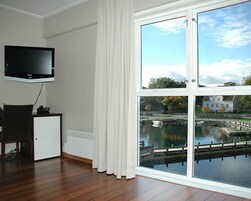 Premium bedding, down comforters, pillowtop beds, in-room safe