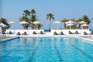 Indoor pool, outdoor pool, pool umbrellas, sun loungers