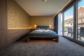 Suite with Balcony, Non Smoking, Aircondition | Hypo-allergenic bedding, minibar, in-room safe, desk - Stadthotel Münster (Münster)