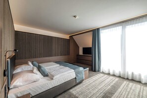 Habitación familiar, para no fumadores | Ropa de cama hipoalergénica y minibar 