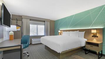 Desk, laptop workspace, blackout drapes, iron/ironing board