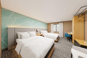 Een bureau, een laptopwerkplek, verduisterende gordijnen