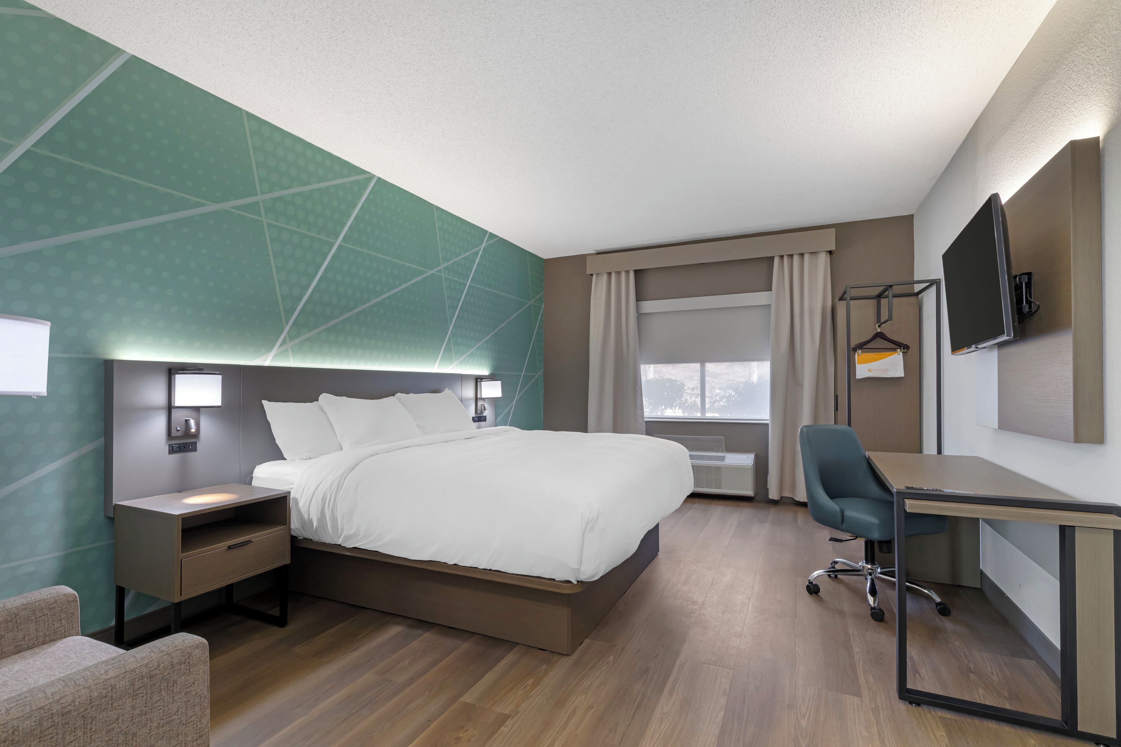 Desk, laptop workspace, blackout curtains, iron/ironing board