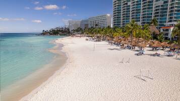 Private beach, white sand, sun-loungers, beach umbrellas