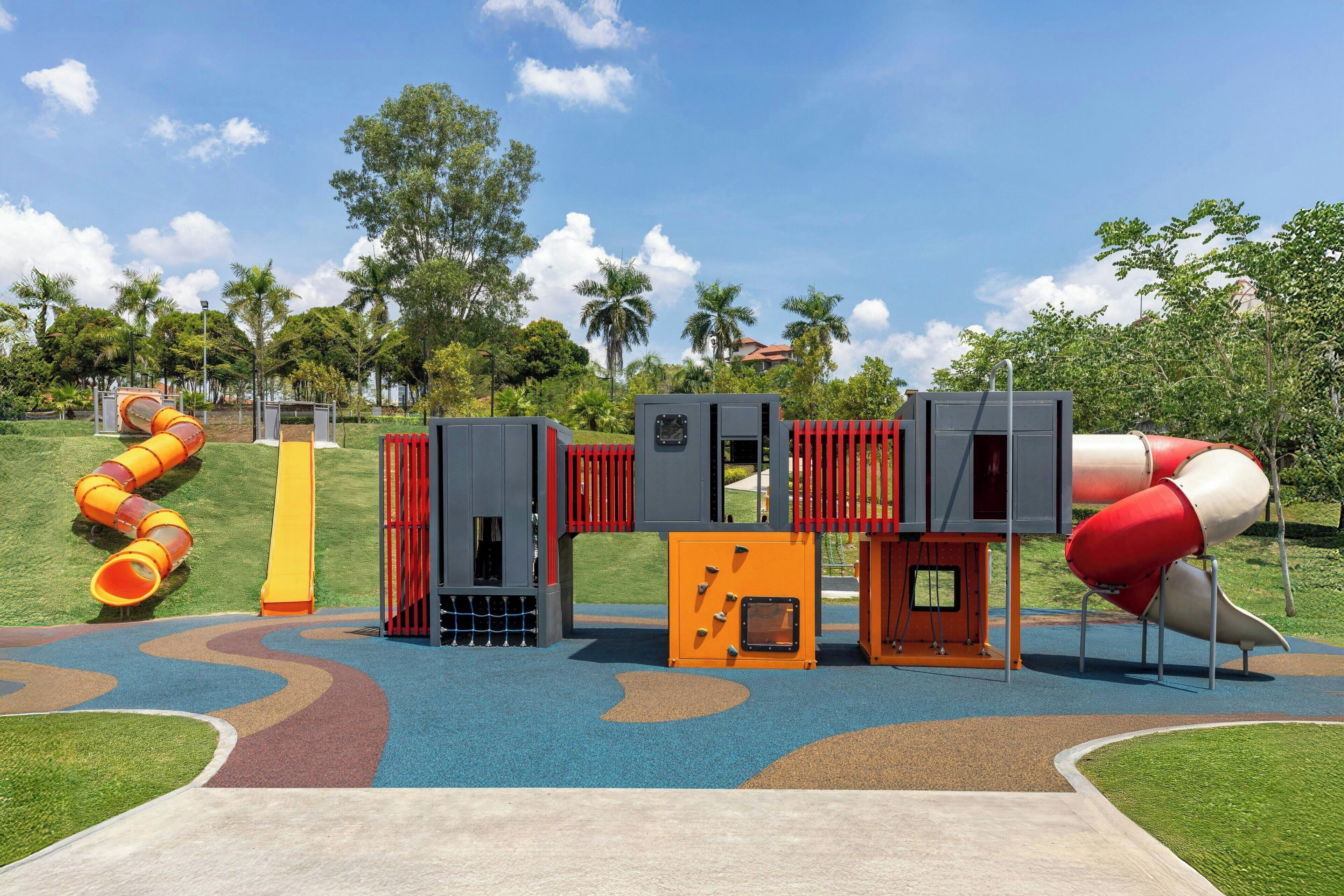 A playground with slides and climbing structures.