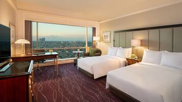 Premium bedding, down comforters, pillowtop beds, minibar