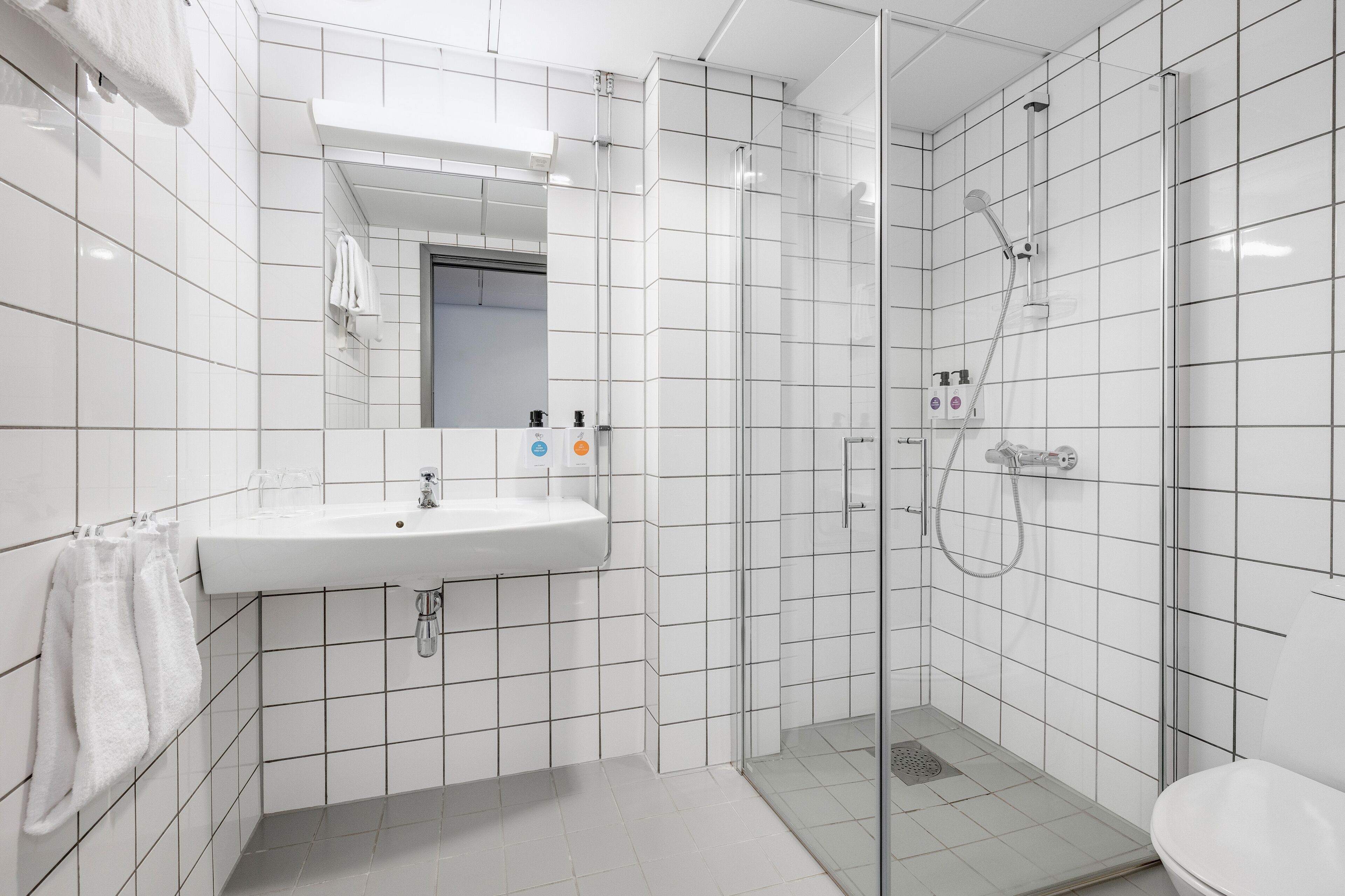 family room | bathroom | shower, hair dryer, towels