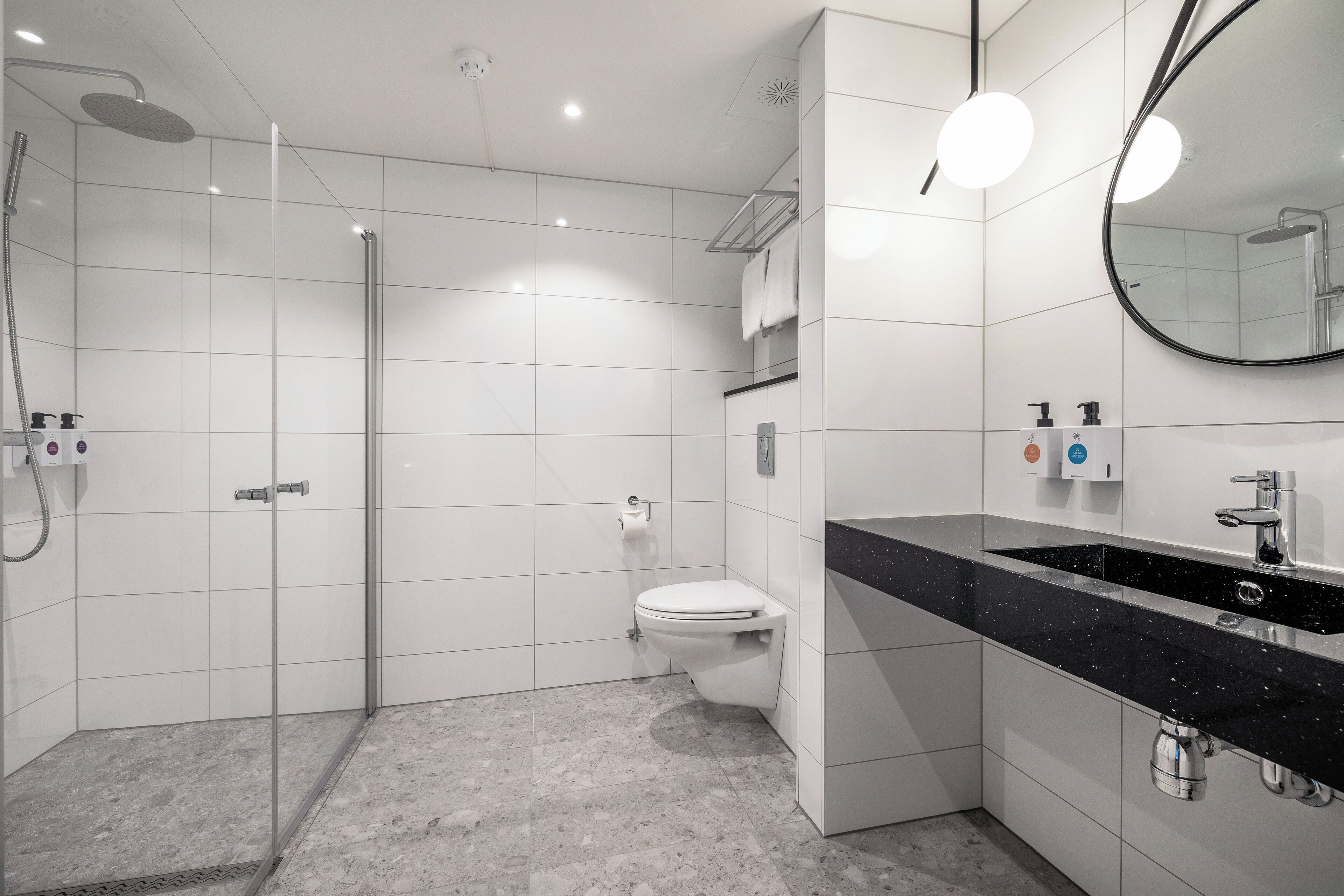 junior suite, non smoking | bathroom | shower, hair dryer, towels