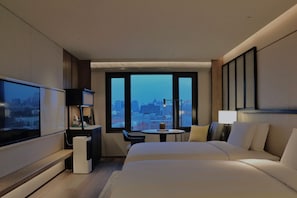 Empark City View Twin Room | Minibar, in-room safe, desk, blackout curtains