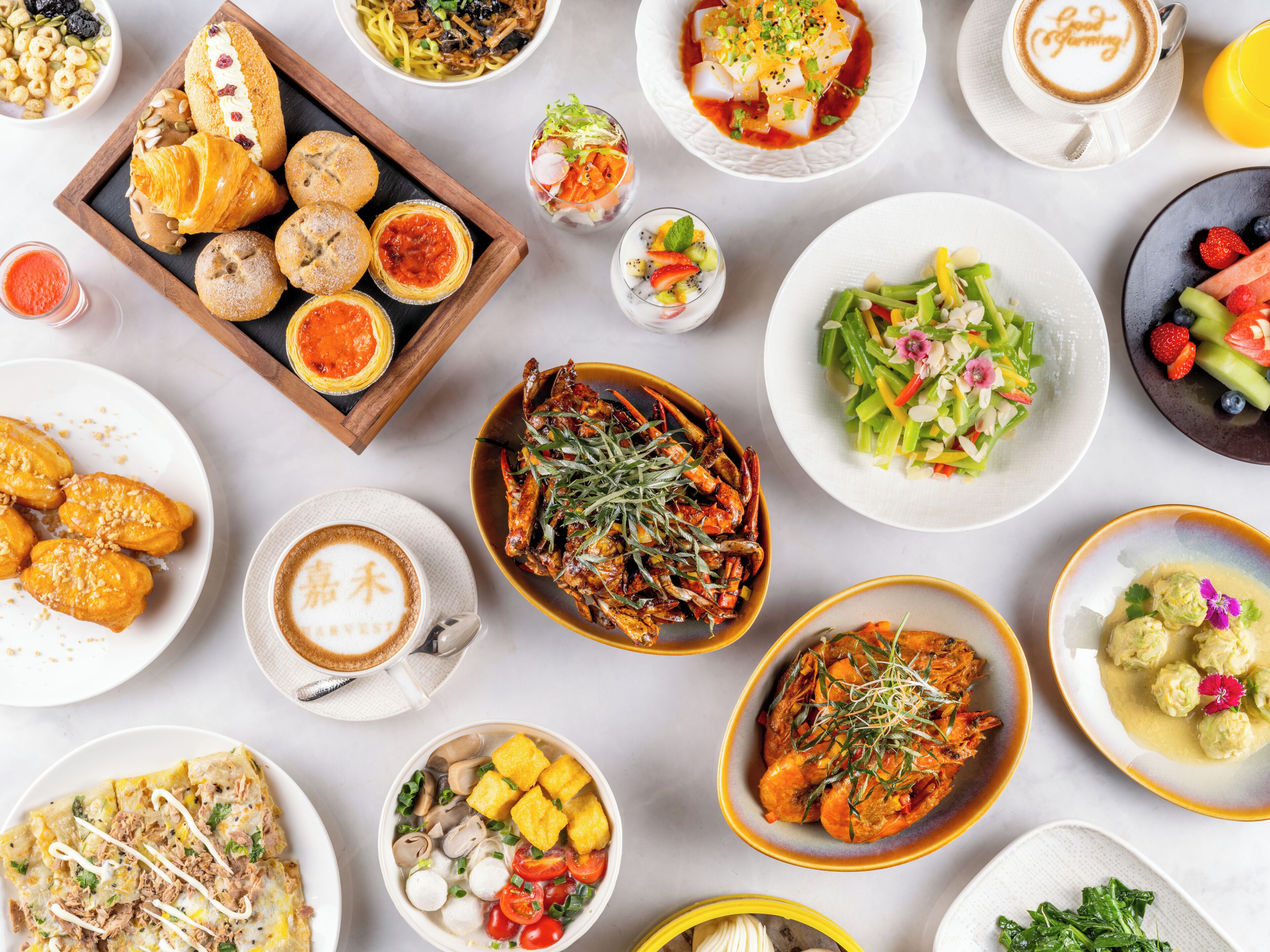 A variety of dishes and beverages on a table, suggesting a dining setting.
