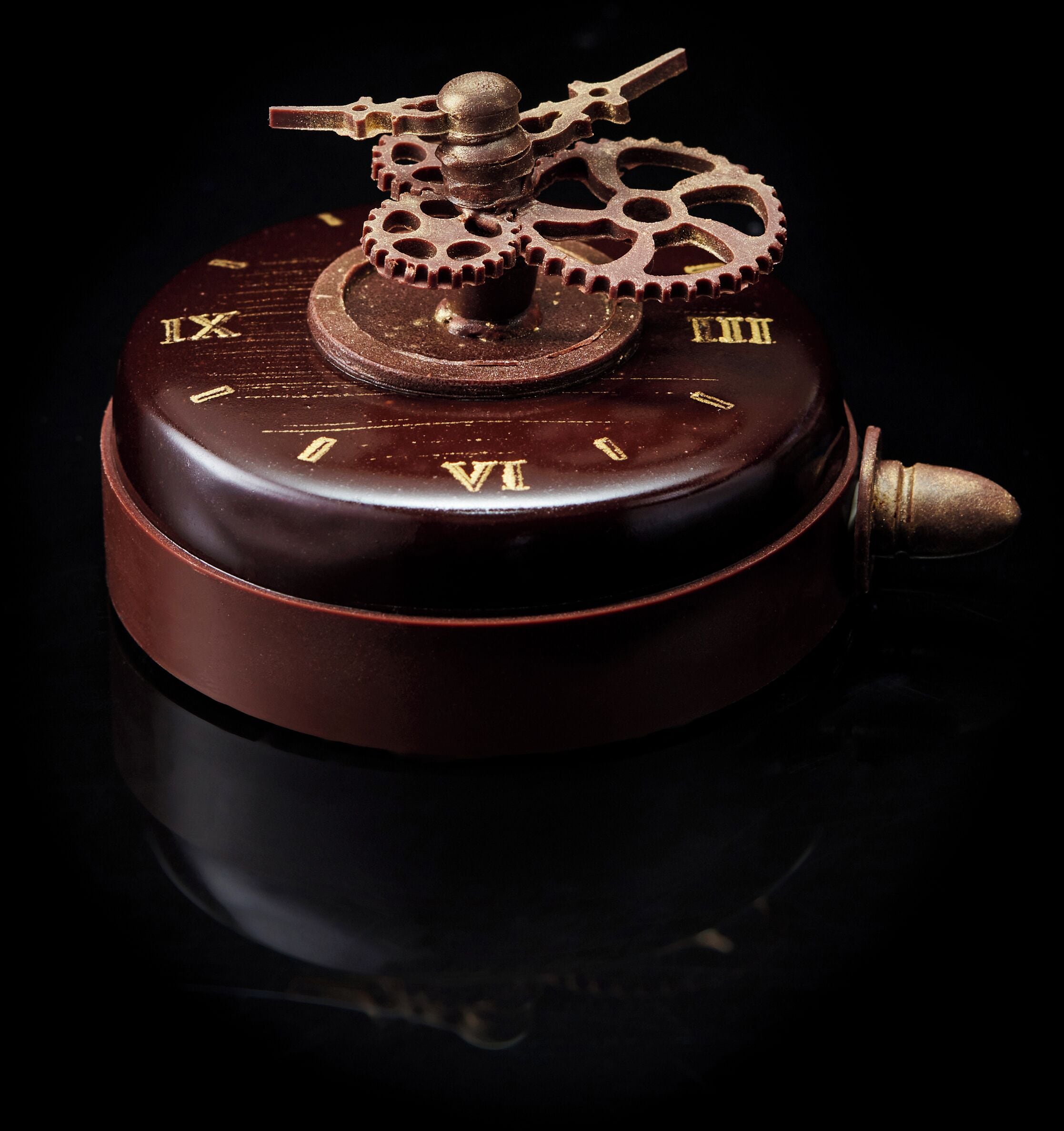 A vintage rotary dial telephone with gears and Roman numerals.