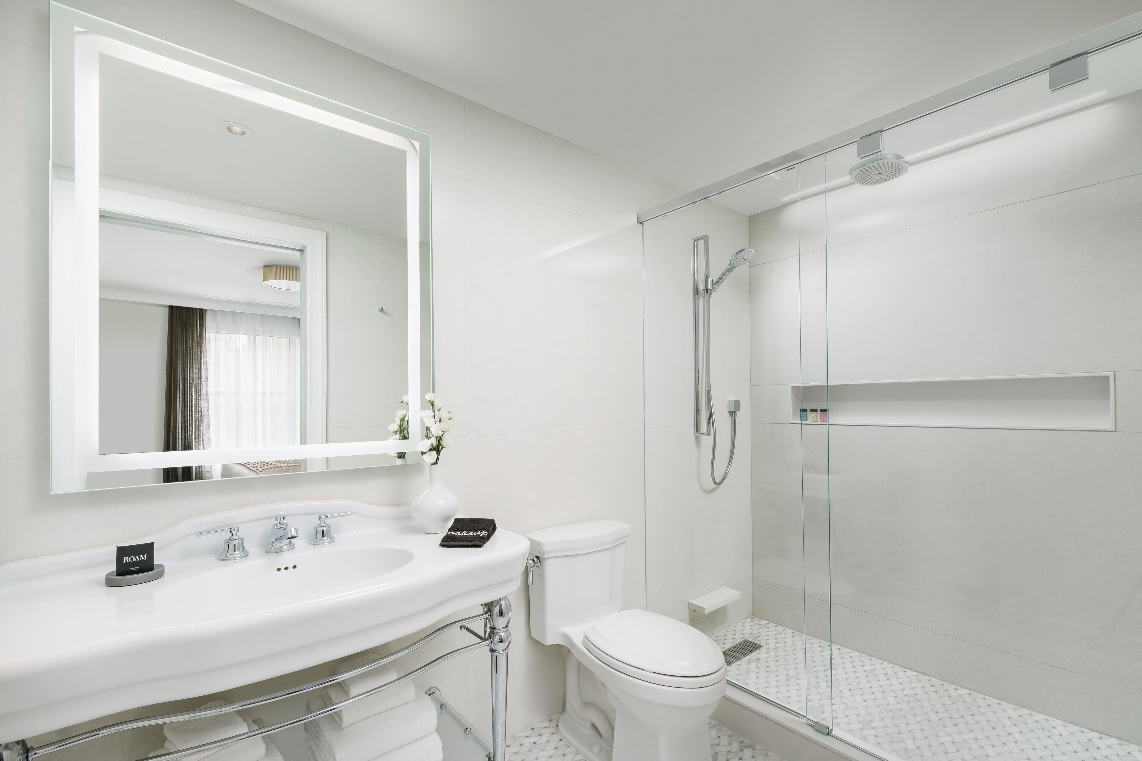 combined shower/bathtub, free toiletries, hair dryer, bathrobes