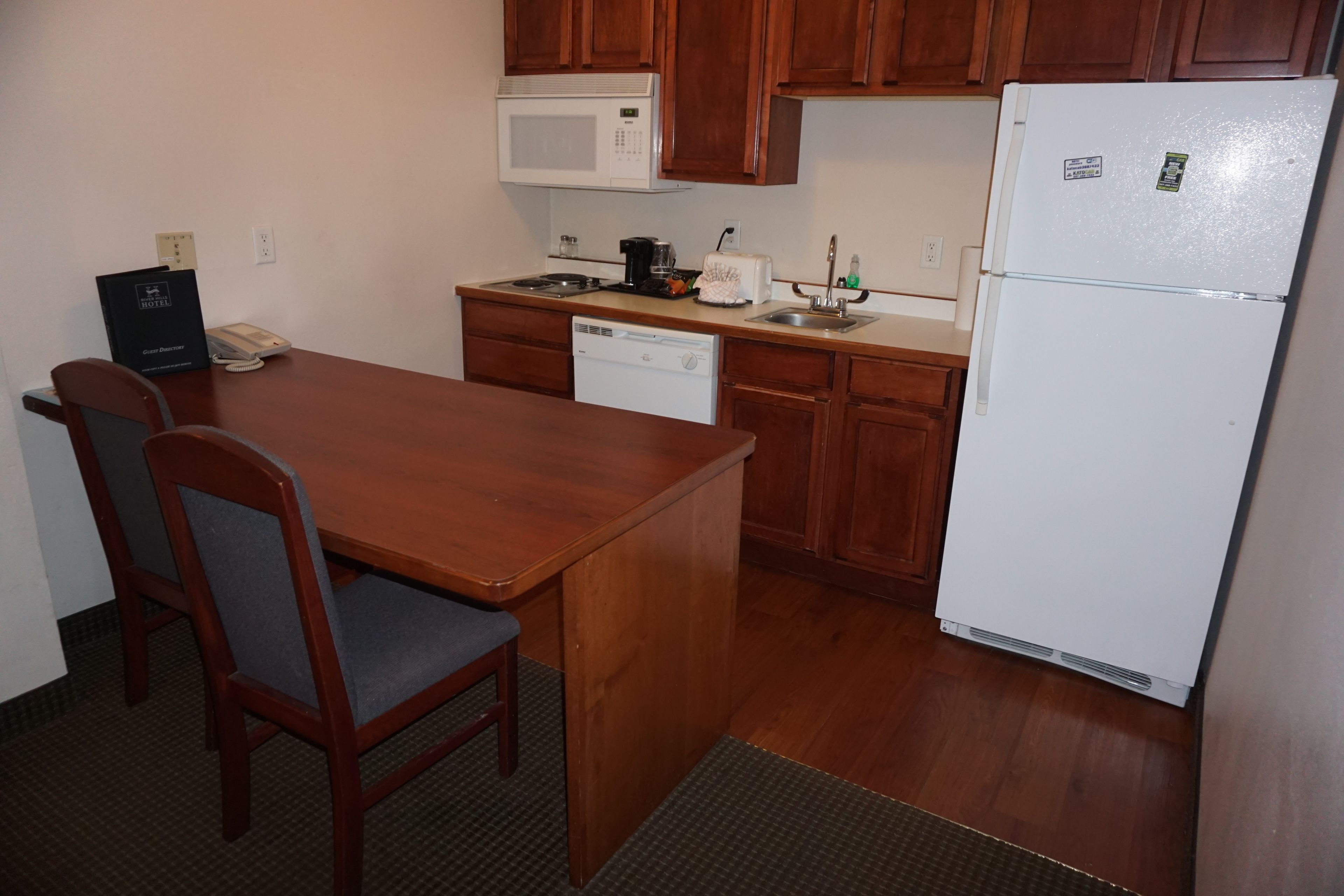 full-sized fridge, microwave, stovetop, dishwasher