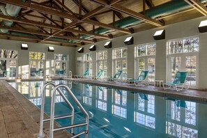 Indoor pool, seasonal outdoor pool, pool umbrellas, pool loungers