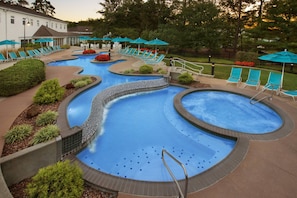 Indoor pool, seasonal outdoor pool, pool umbrellas, pool loungers