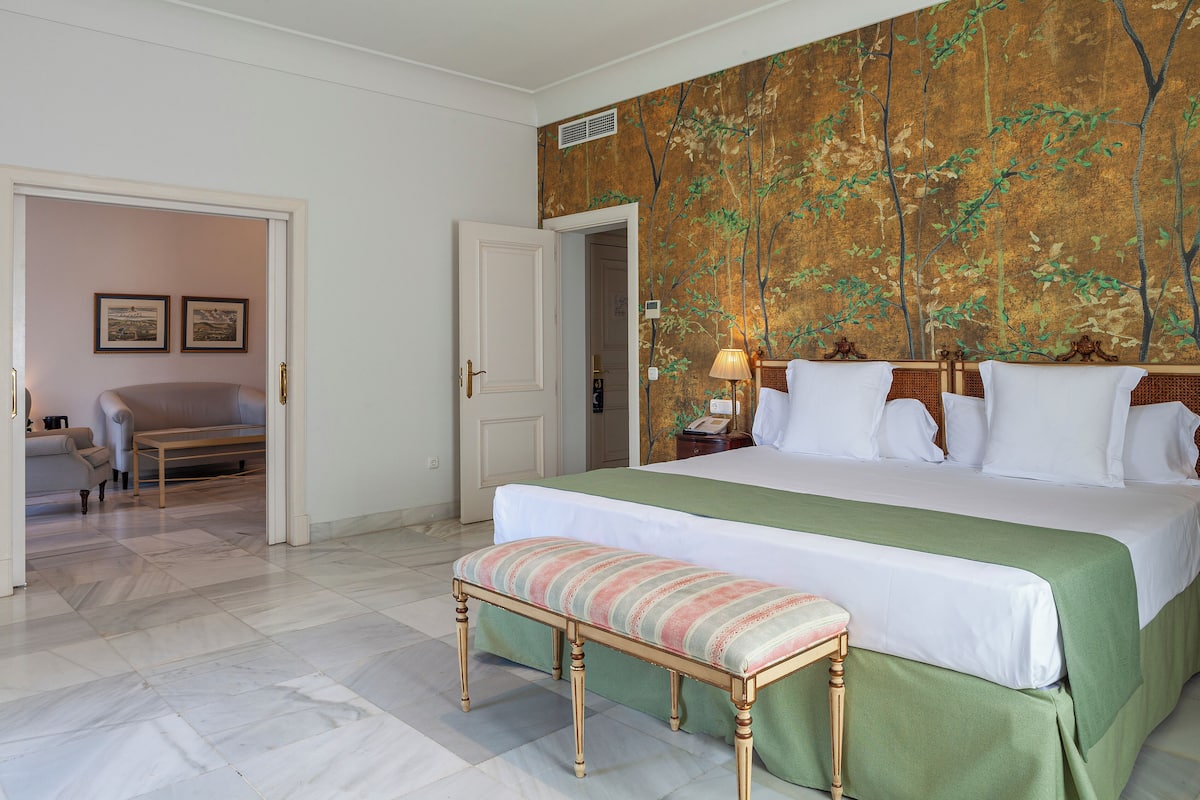 Junior Suite, Garden View | 1 bedroom, premium bedding, memory foam beds, free minibar