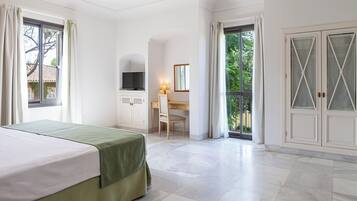 Junior Suite, Garden View | 1 bedroom, premium bedding, memory foam beds, free minibar