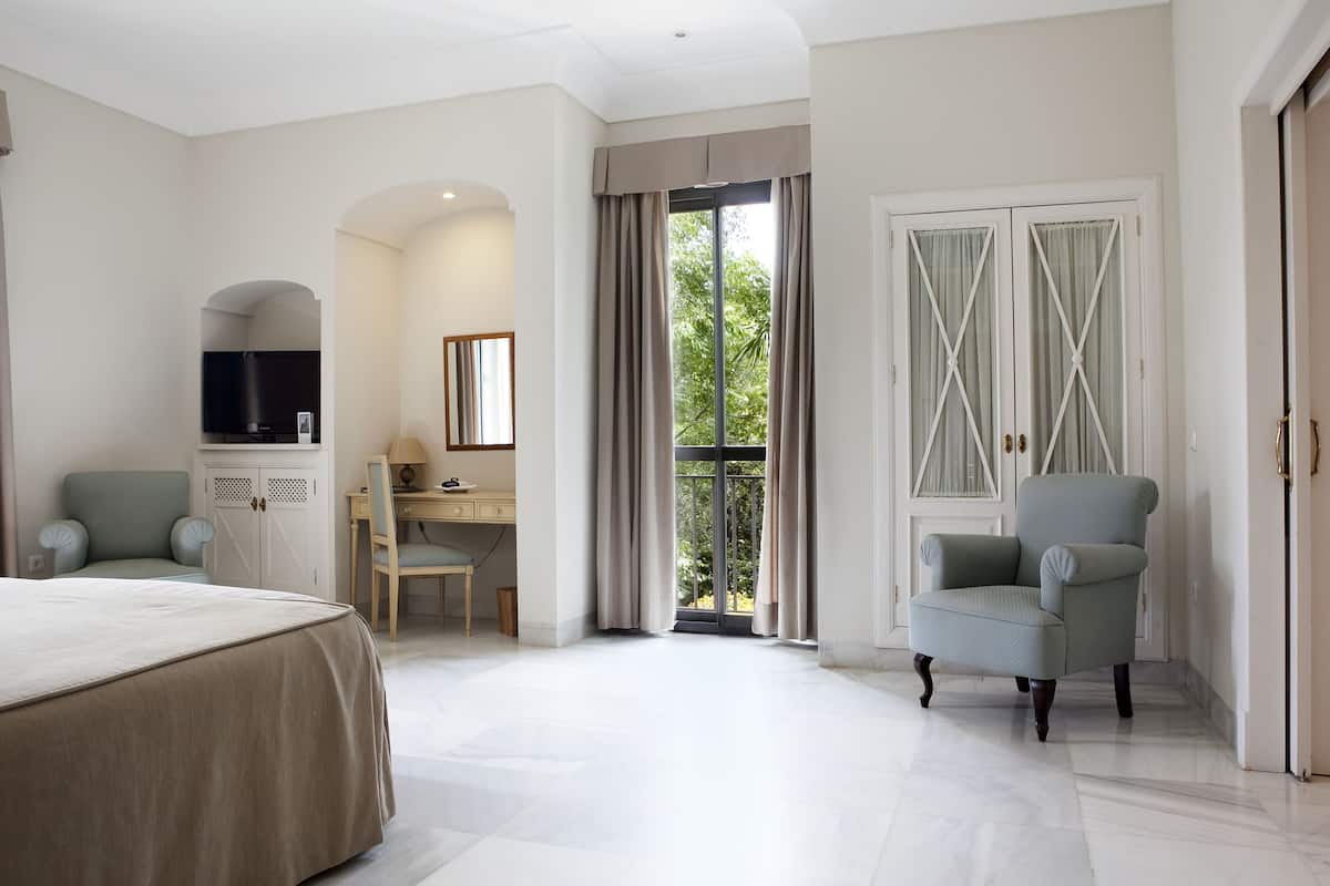 junior suite, garden view | 1 bedroom, premium bedding, memory-foam beds, free minibar