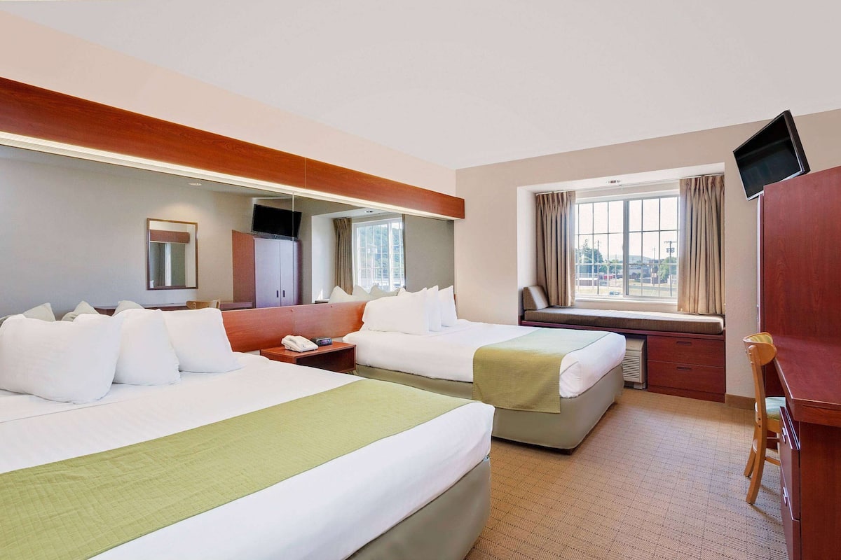 room, 2 queen beds, non smoking | premium bedding, desk, iron/ironing board, free cots/infant beds