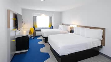 Premium bedding, desk, iron/ironing board, free cribs/infant beds