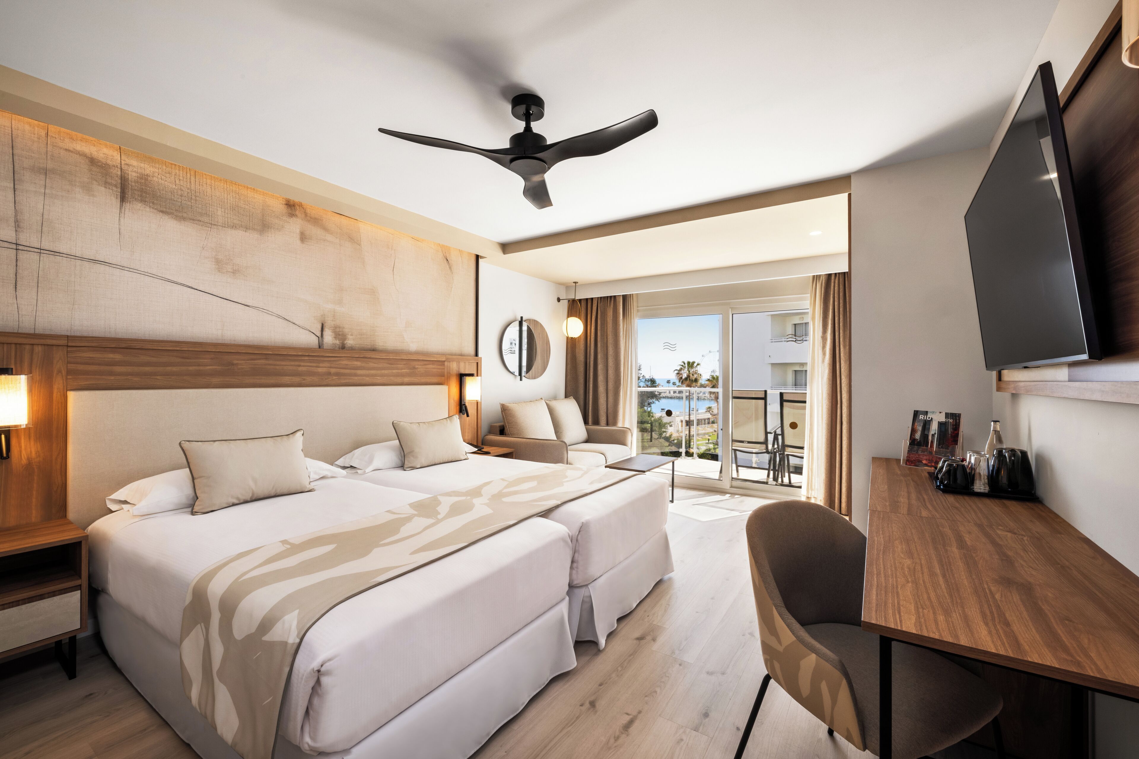 Double Room, Balcony, Partial Sea View | Minibar, in-room safe, free WiFi, bed sheets