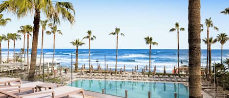 Indoor pool, outdoor pool, pool umbrellas, pool loungers