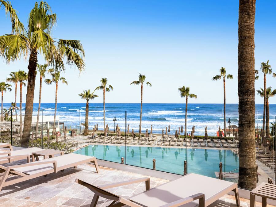 Indoor pool, outdoor pool, pool umbrellas, sun loungers